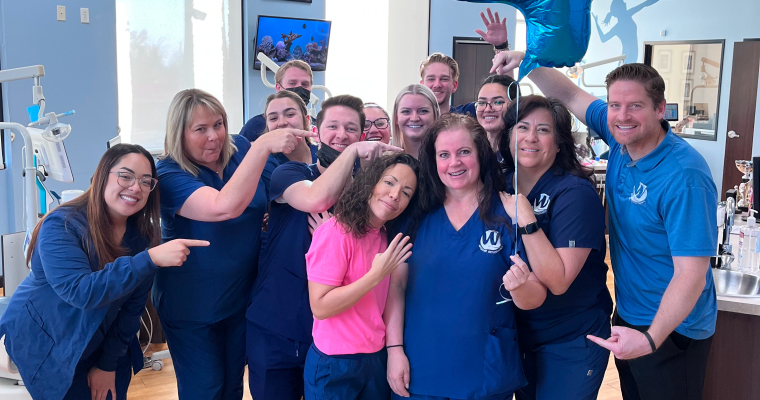 Webster Ortho team posing together for a photo